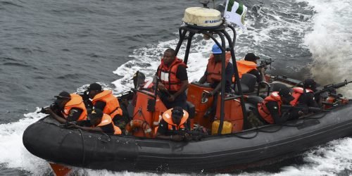 Special forces of the Nigerian navy sails to apprehend pirates in a mock operations during the five-day joint military exercise between Nigeria and French navy codenamed Grand African NEMO (Navy Exercise Maritime Operations) in Nigerian waters on October 30, 2019. The Nigerian Navy has participated in a five-day multinational military exercise codenamed Grand African NEMO (Navy Exercise Maritime Operations), and with a joint naval drills with the French counterpart designed to support regional navies and allied nations to check criminal activities and perfect strategies in tackling maritime crimes in the Gulf of Guinea. (Photo by PIUS UTOMI EKPEI / AFP)